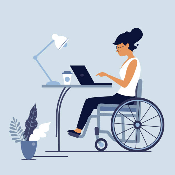 kobieta siedząca na wózku inwalidzkim korzystająca z laptopa